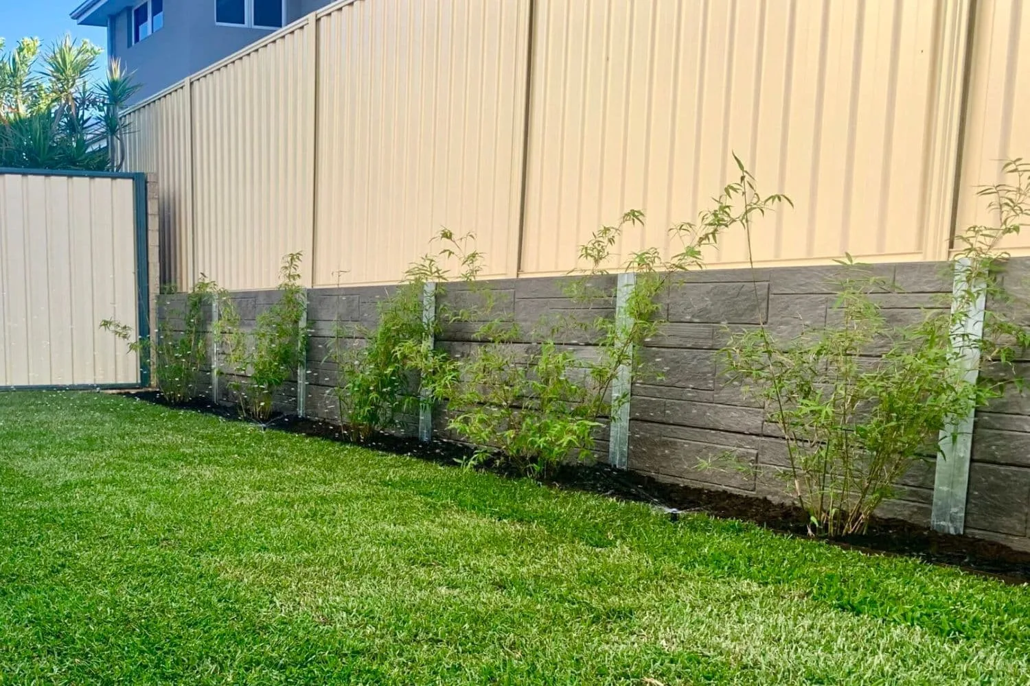 Concrete sleeper retaining wall installation in Moreton Bay